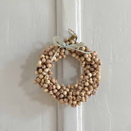 Petite couronne en perles de bois