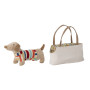 Peluche chien dans son panier