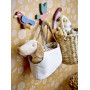 Peluche chien dans son panier