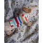 Peluche chien dans son panier