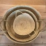 Corbeille ronde en feuille de palmier